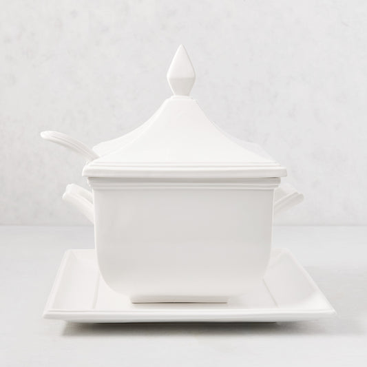 Milano white ceramic soup tureen with lid, handles, and serving spoon on a rectangular tray.