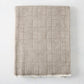 Mink brown Sutton Houndstooth throw blanket, 51"W x 67"L, cotton-acrylic blend with raw edge.