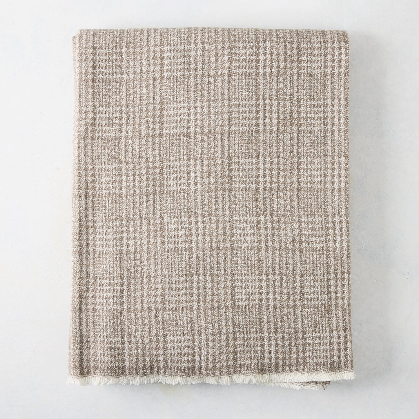 Mink brown Sutton Houndstooth throw blanket, 51"W x 67"L, cotton-acrylic blend with raw edge.
