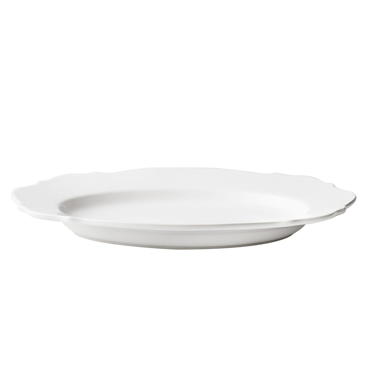 Large white ceramic Lungarno serve platter with softened edges and a smooth glossy glaze, 16.3-inch oval design.
