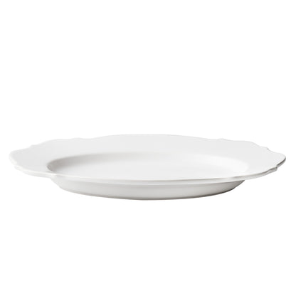 Large white ceramic Lungarno serve platter with softened edges and a smooth glossy glaze, 16.3-inch oval design.
