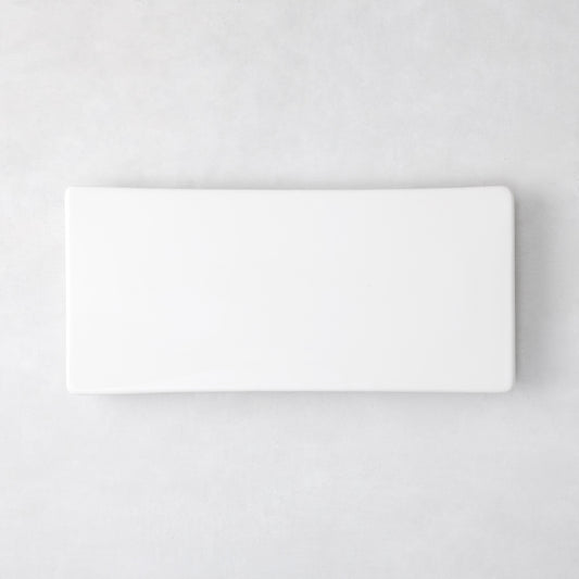 Modern rectangular white ceramic serving platter, 14.75"L x 6.75"W, with clean lines and low profile.