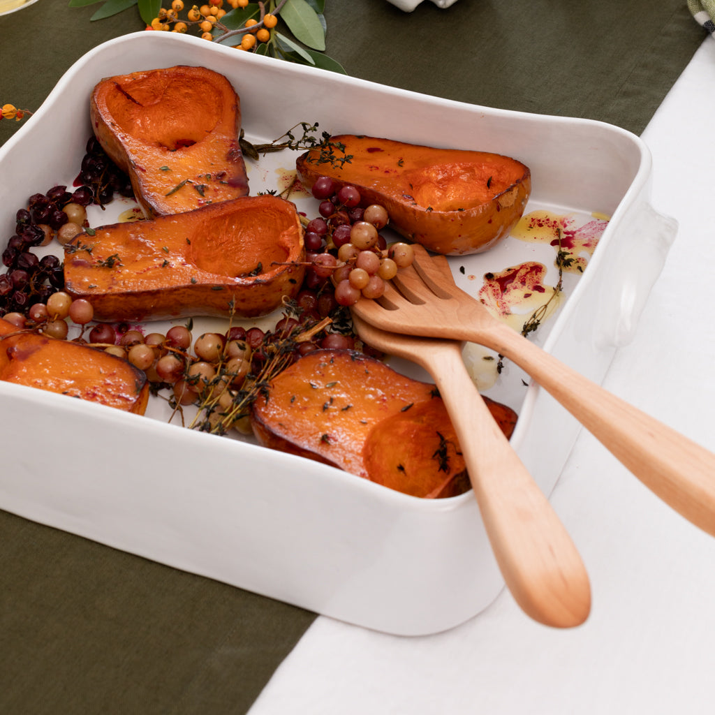 HG Handmade Ceramic Rectangular Baking Dish by Montes Doggett, creamy white glaze, filled with roasted butternut squash.