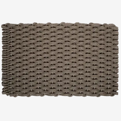 Mushroom Braided Rope Doormat, handwoven from durable, weather-resistant rope in a tight, textured weave.
