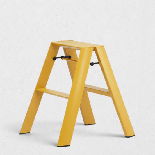 Hudson Grace mustard yellow Hasegawa Lucano 2-step ladder with a minimalist aluminum and steel design.
