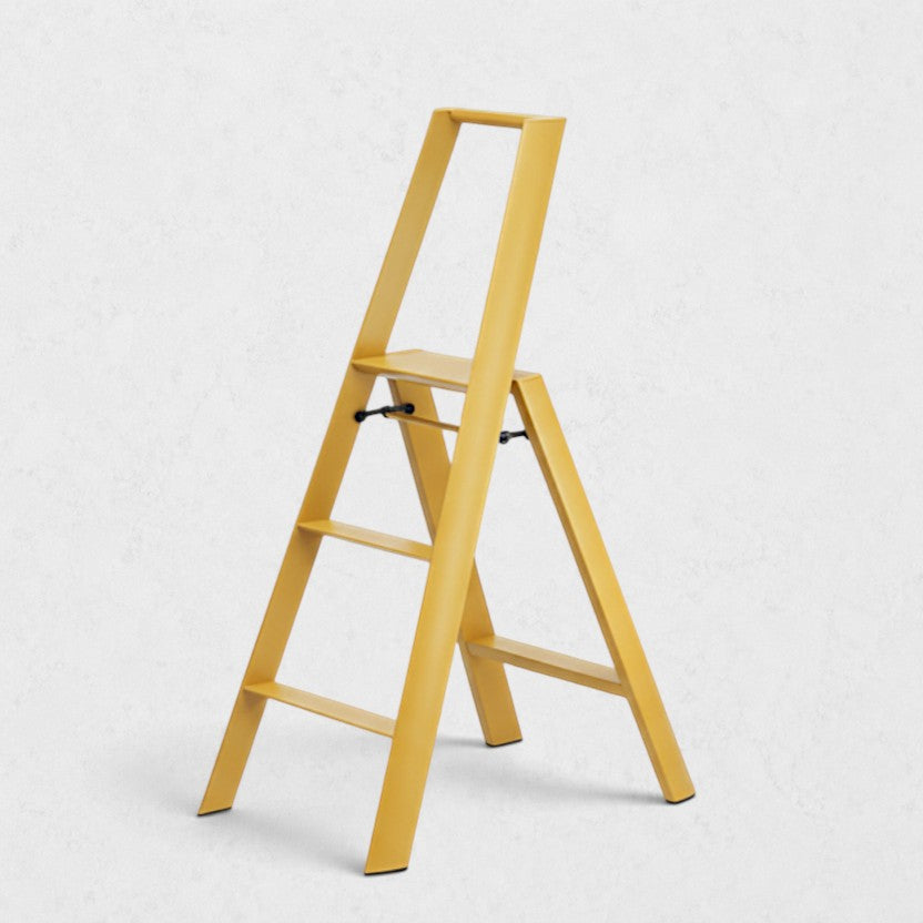 Hudson Grace mustard yellow Hasegawa Lucano 3-step ladder with a sleek aluminum and steel design.