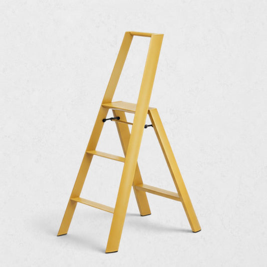 Hudson Grace mustard yellow Hasegawa Lucano 3-step ladder with a sleek aluminum and steel design.