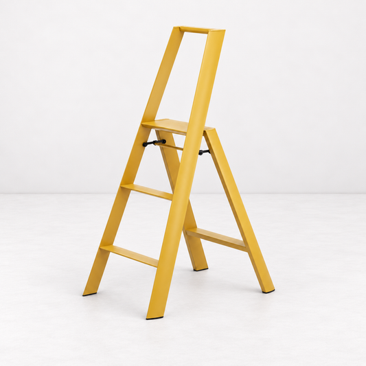 Mustard yellow Hasegawa Lucano 3-step ladder in aluminum and steel with a minimalist design and safety latch.