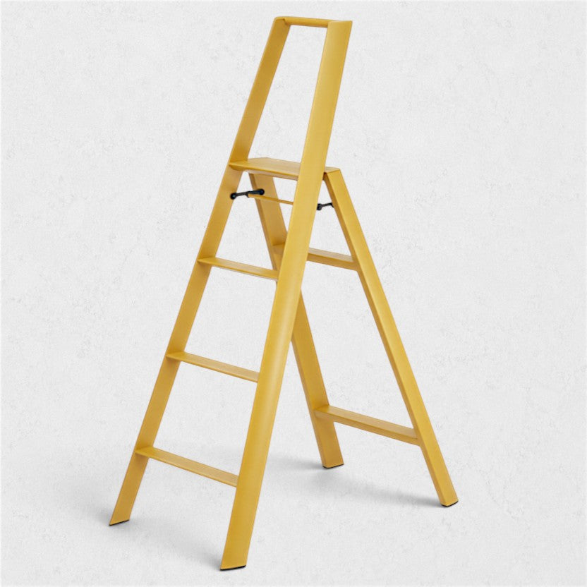 Hudson Grace mustard yellow Hasegawa Lucano 4-step ladder with a minimalist aluminum and steel design.