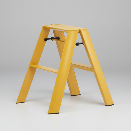 Mustard yellow Lucano Hasegawa 2-step lightweight aluminum and steel ladder with black accents.