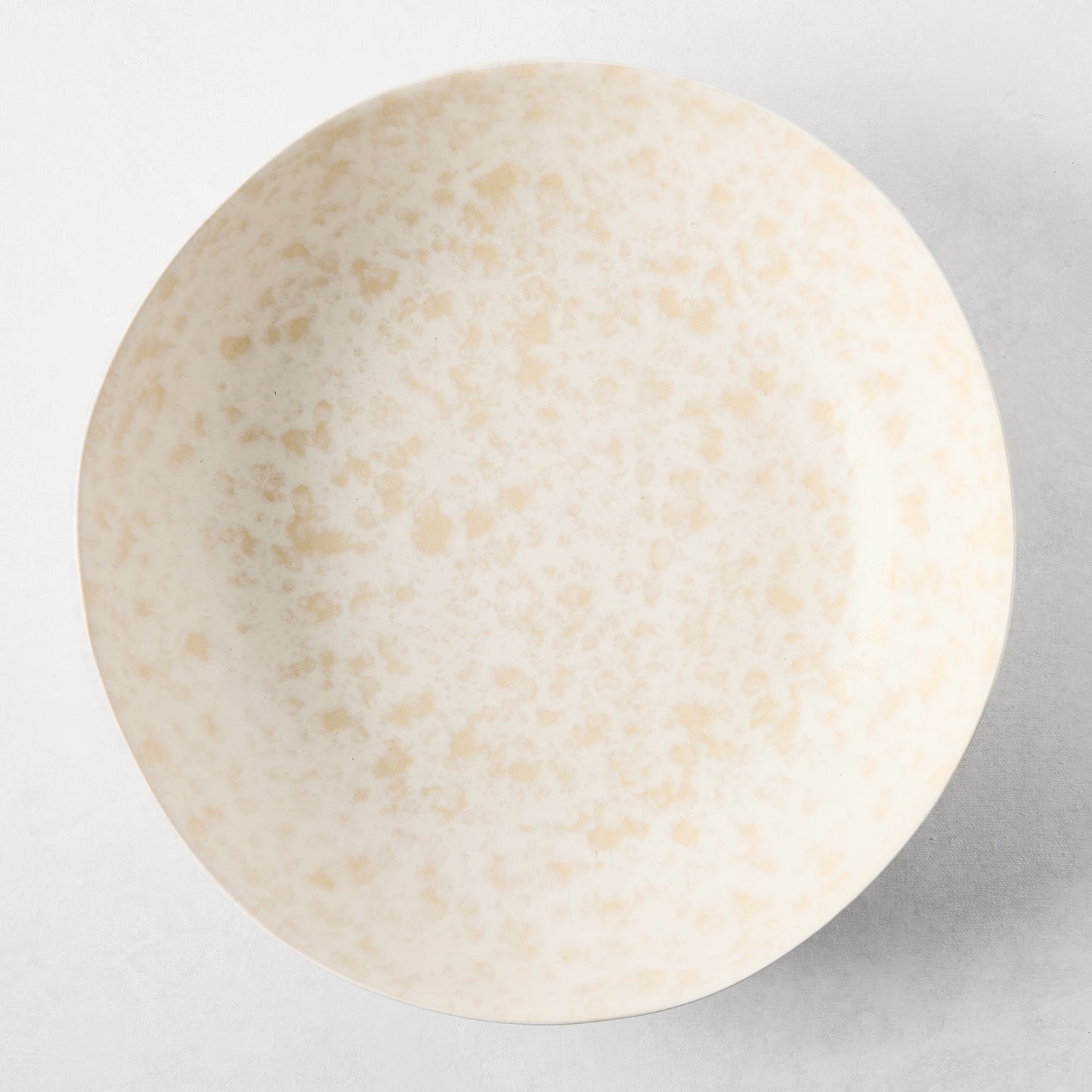 Natural Nuno Splatter Stoneware Serve Bowl, pale cream with beige splatter, 12"Dia coupe shape.