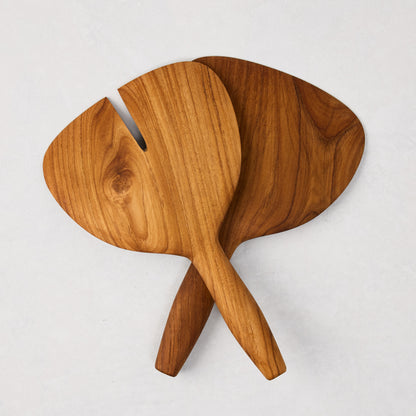 Natural teak wood short-handled 2-piece serving set, 9"L x 5.5"W, with one slotted server.