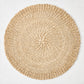 Hudson Grace natural woven round abaca placemat, 16"Dia, honey-brown hue.