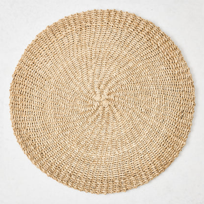 Hudson Grace natural woven round abaca placemat, 16"Dia, honey-brown hue.