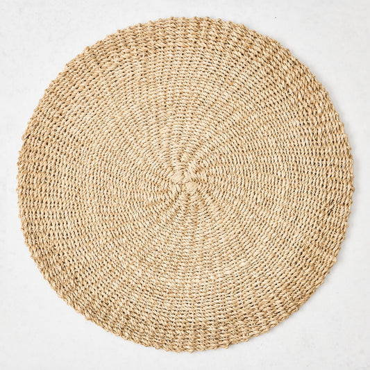 Hudson Grace natural woven round abaca placemat, 16"Dia, honey-brown hue.