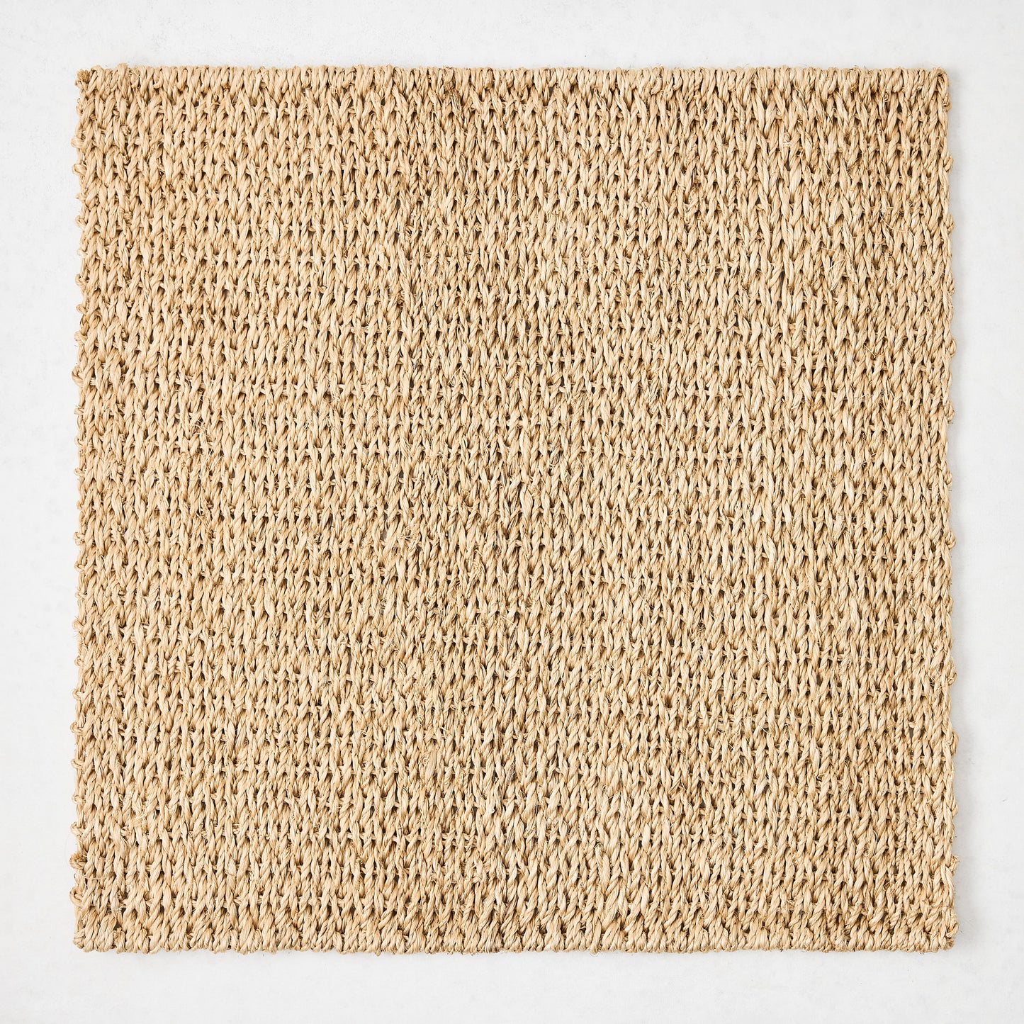 Natural Woven Square Placemat, 16" honey-brown abaca, handcrafted texture.