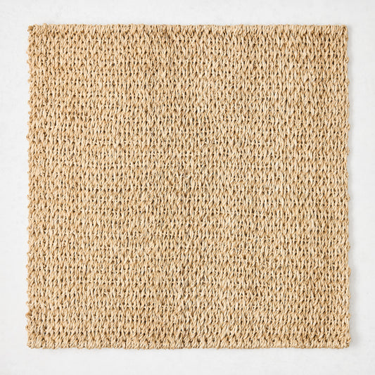 Natural Woven Square Placemat, 16" honey-brown abaca, handcrafted texture.