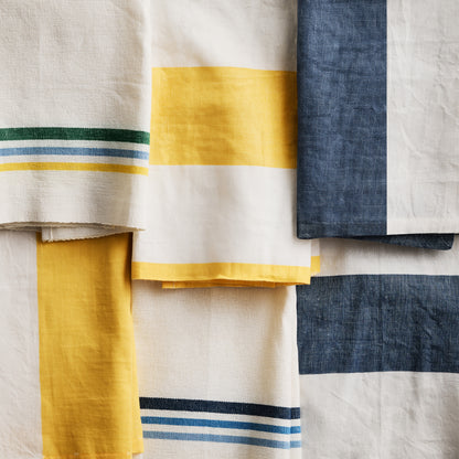 Navy and white block print hand towels, set of 2, with stripe and half-pattern designs.