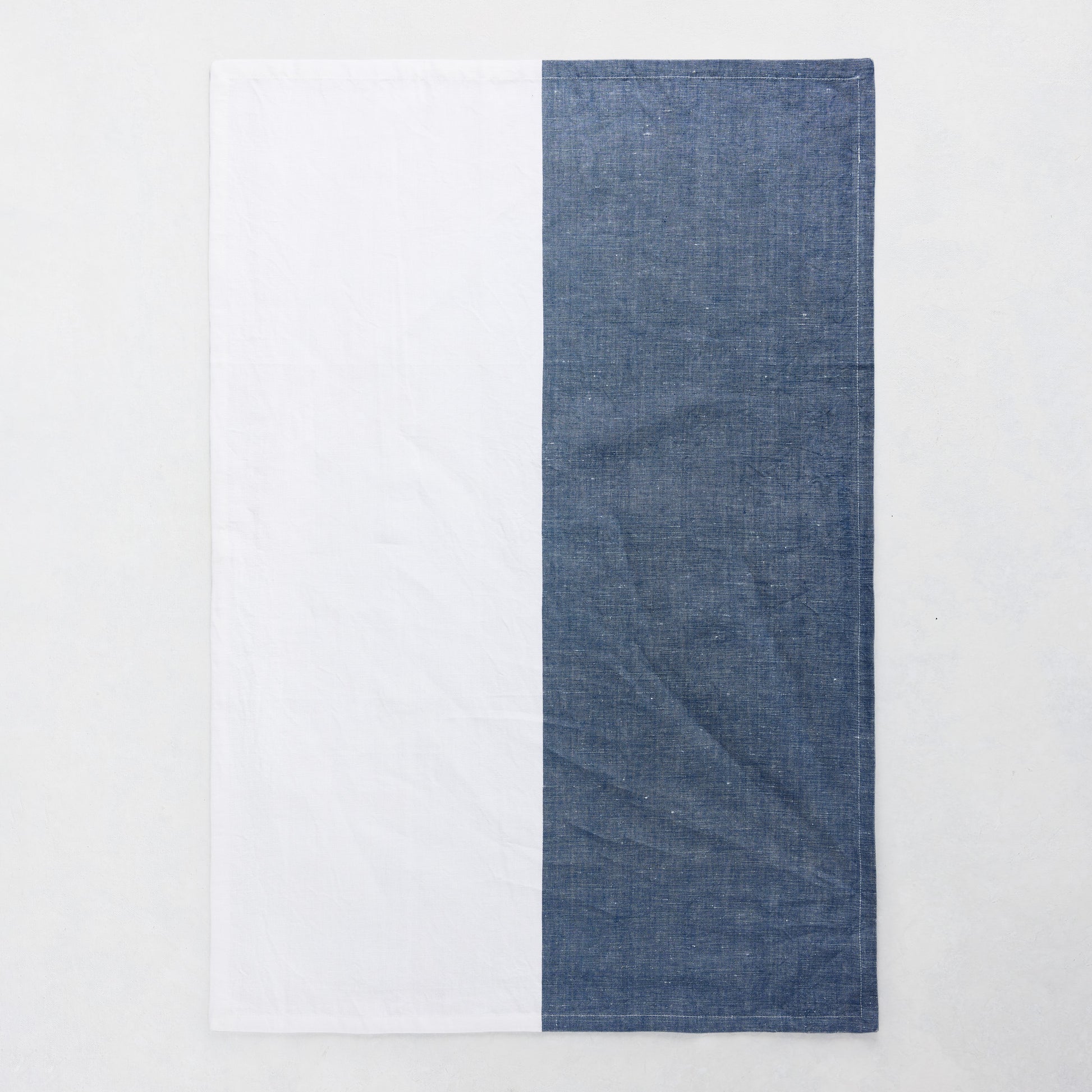 Navy and white block print hand towel, 50% cotton, 50% linen, 20"W x 30"L.