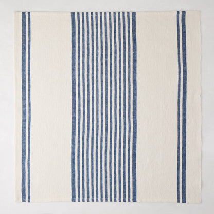 Navy Boat Stripe Napkin, 22" square, woven cotton-linen blend with vertical blue and white stripes.