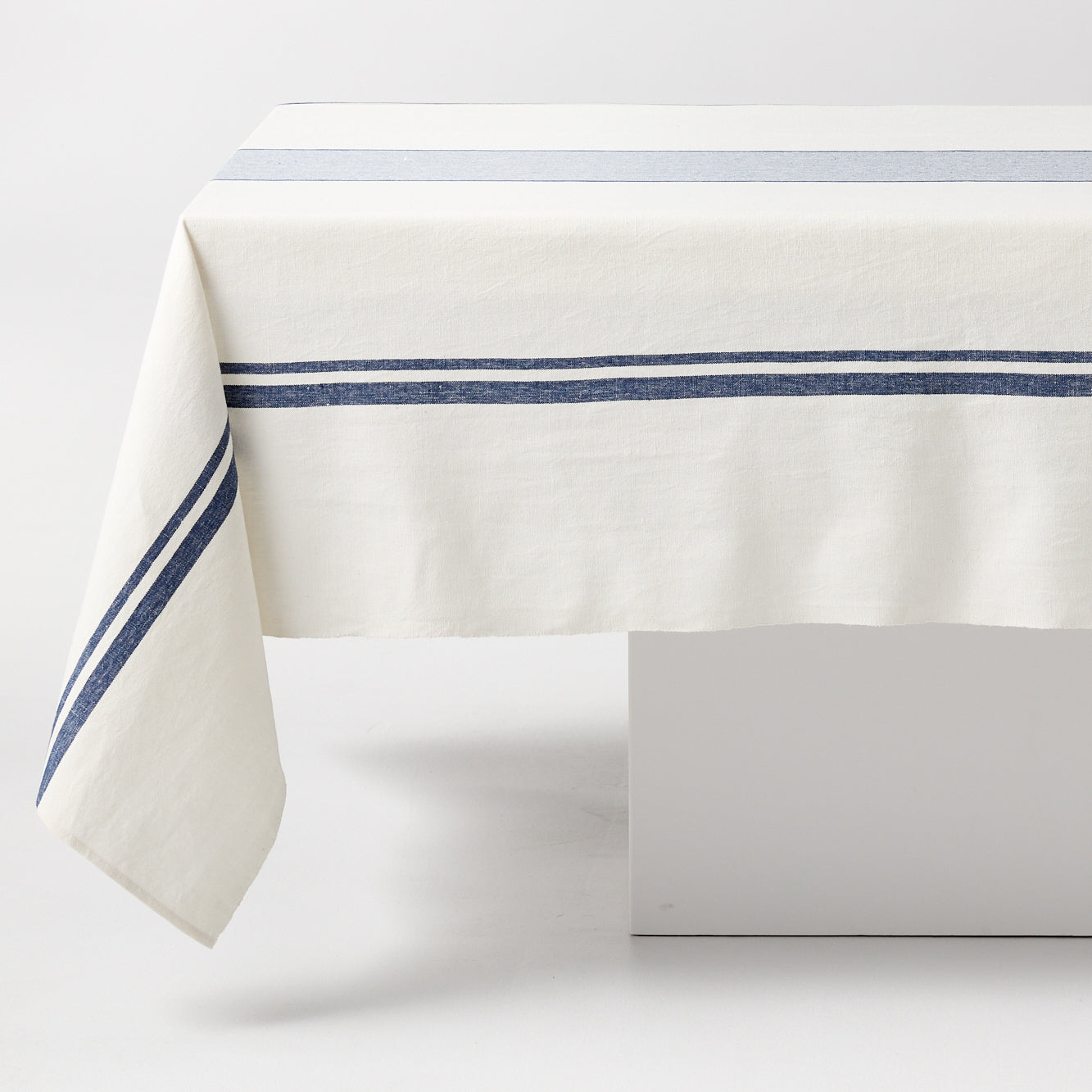 Navy Boat Stripe Tablecloth, 70"x108" cotton-linen blend, with blue horizontal stripes on cream.