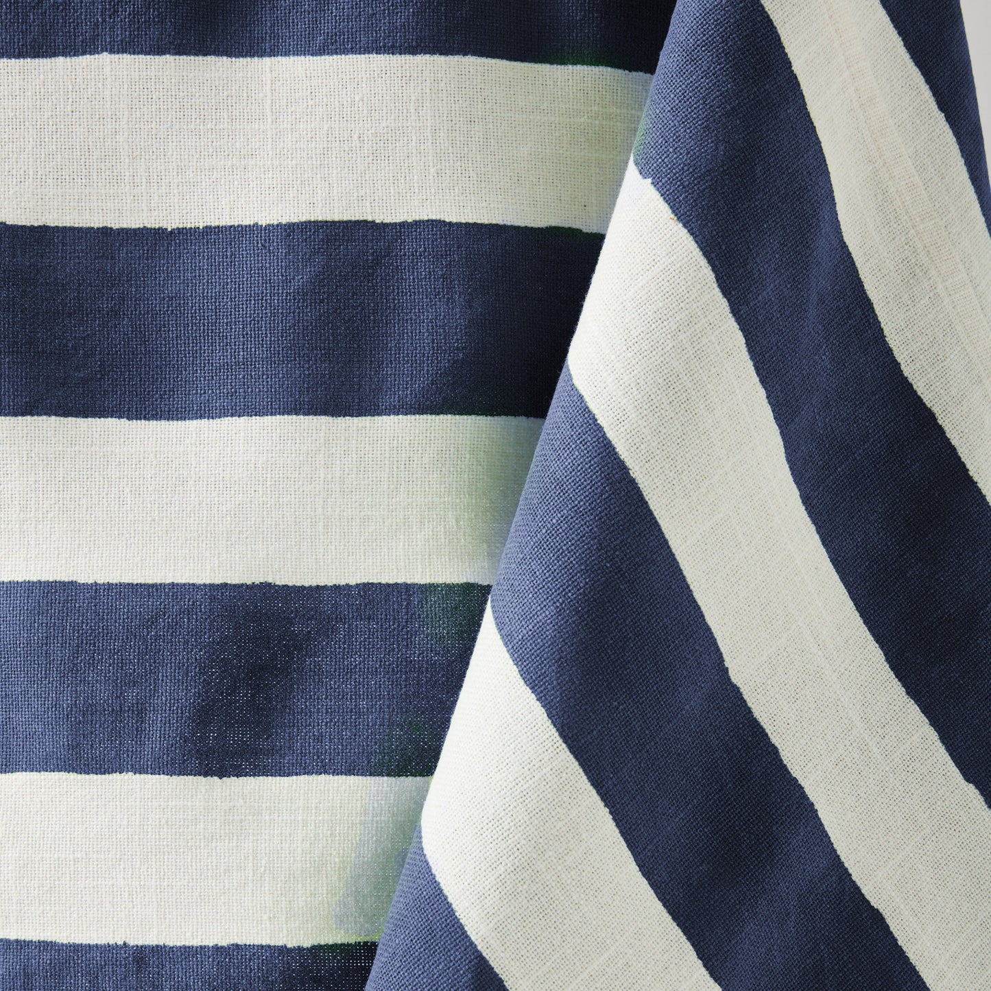 Navy Hampton Stripe Tablecloth, 100% cotton, 70"x108", with bold navy and white horizontal stripes.