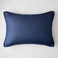 Navy blue linen and velvet reversible lumbar pillow, 20"L x 14"H.