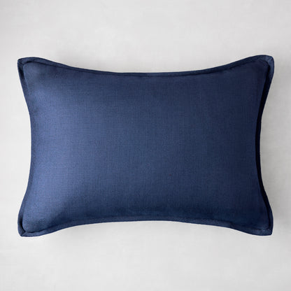 Navy blue linen and velvet reversible lumbar pillow, 20"L x 14"H.