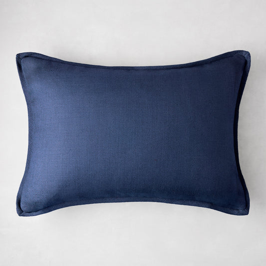 Navy blue linen and velvet reversible lumbar pillow, 20"L x 14"H.
