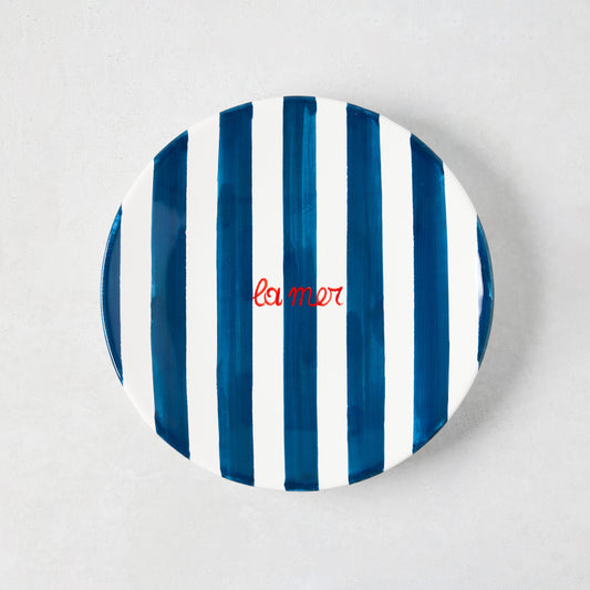 Hand-painted Italian ceramic appetizer plate with navy blue stripes and red "La Mer" text.