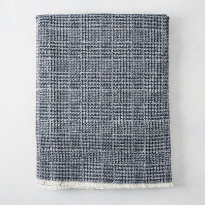 Navy Blue Sutton Houndstooth Throw Blanket, 72"L x 51"W, with fringed edge.