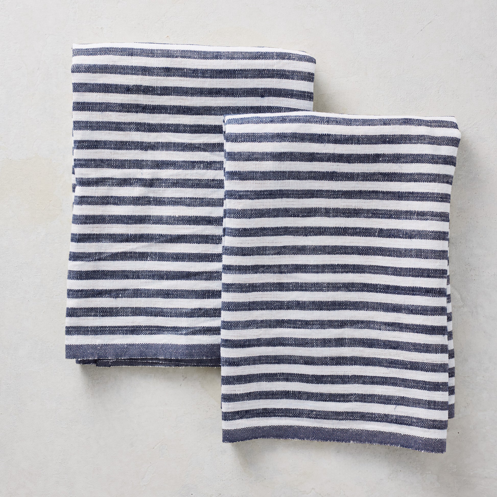 Set of two navy blue and white ticking stripe 100% linen hand towels, 30x20 inches.