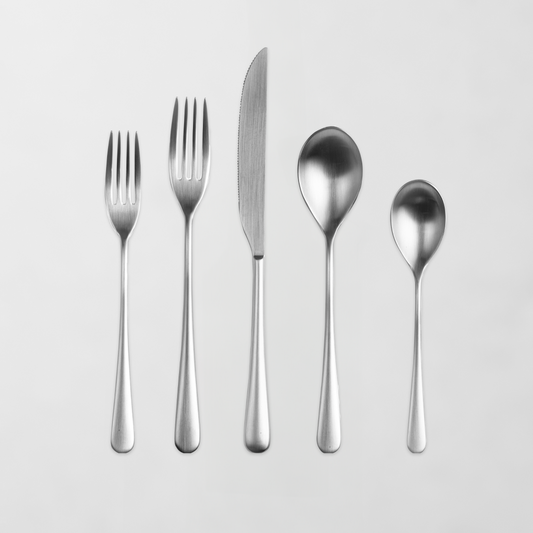 Neve Ice 5-piece flatware set: two silver forks, a knife, and two spoons made of 18/10 stainless steel.