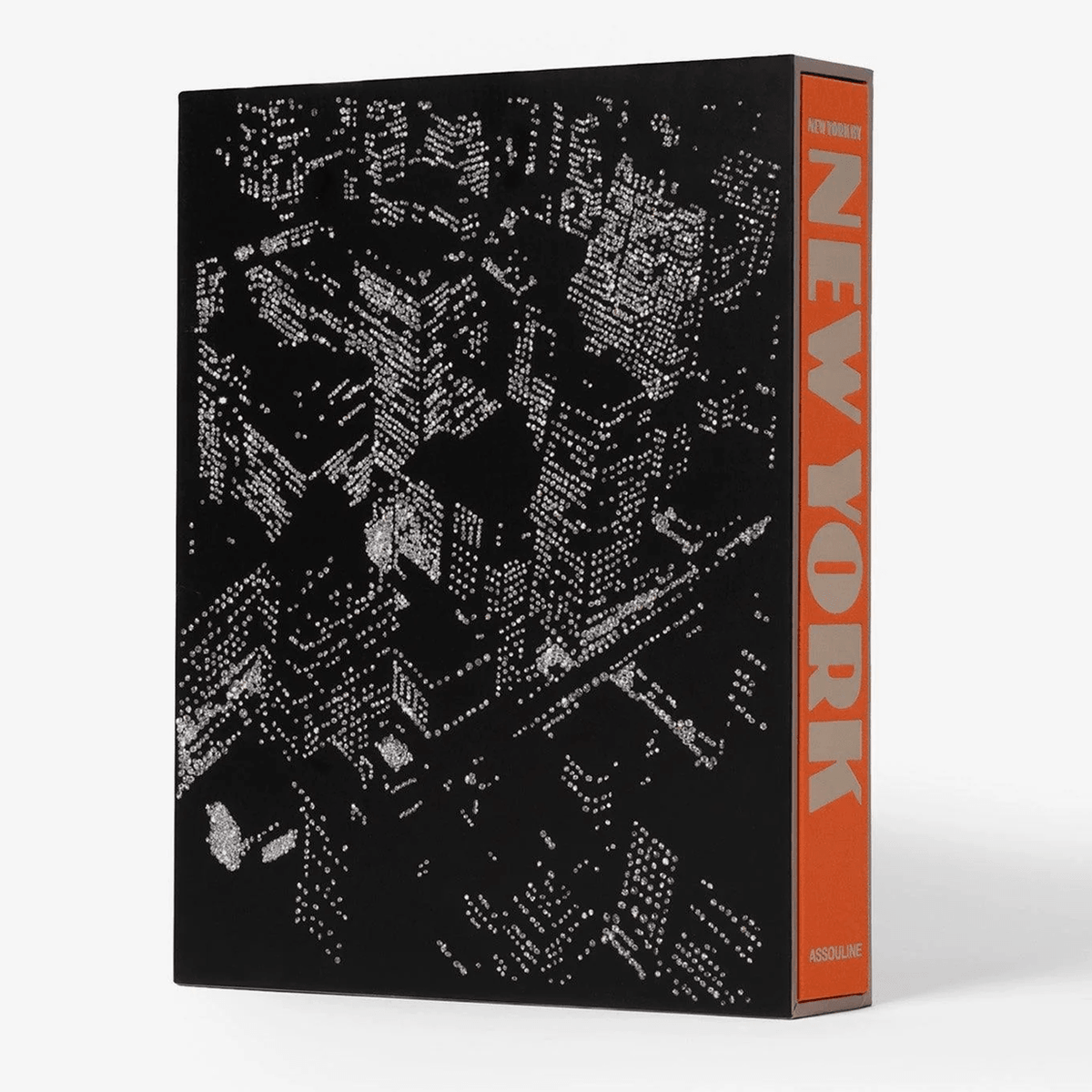 Black linen hardcover book "New York By New York" in a slipcase with an orange spine and city map design.