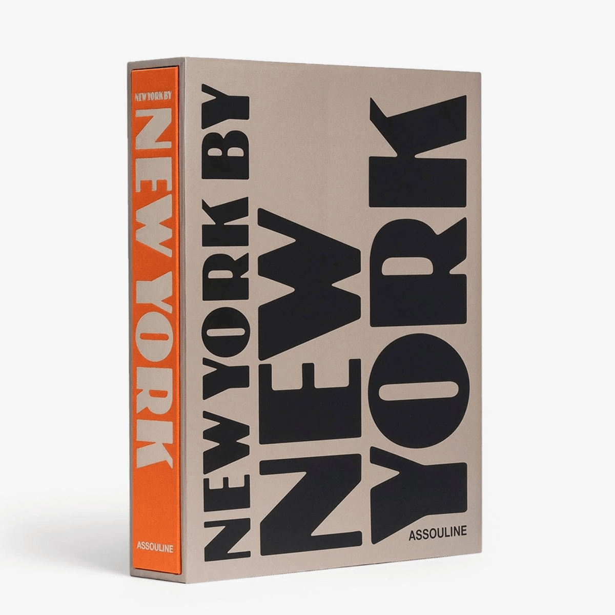 New York By New York" Assouline book with beige cover, bold black typography, and orange spine.