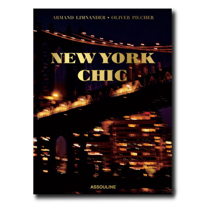 New York Chic" silk hardcover book with gold title over a blurred night city bridge scene.