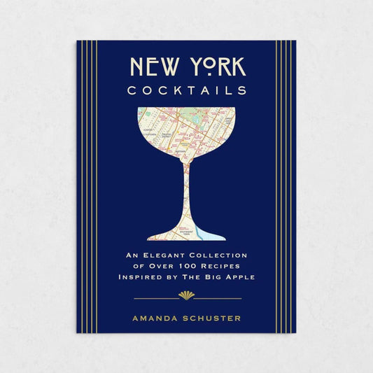 New York Cocktails book with a navy blue cover, gold stripes, and a map of NYC in a cocktail glass silhouette.