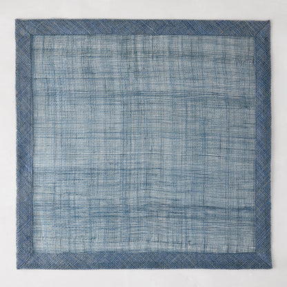 Newport Blue 15" square Abaca placemat with a deeper blue woven border.
