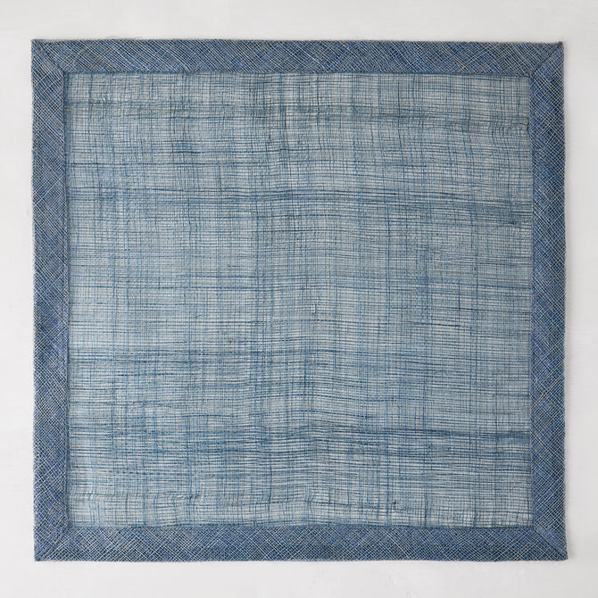 Newport Blue 15" square Abaca placemat with a deeper blue woven border.