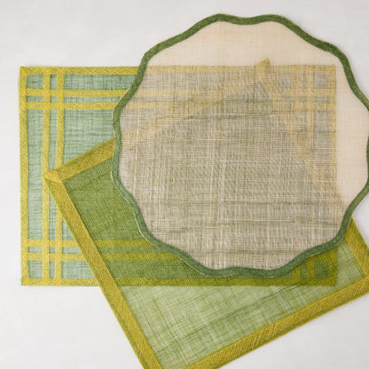 Newport Green Border Scallop Abaca Placemat, 16" Dia, with two other green placemats.
