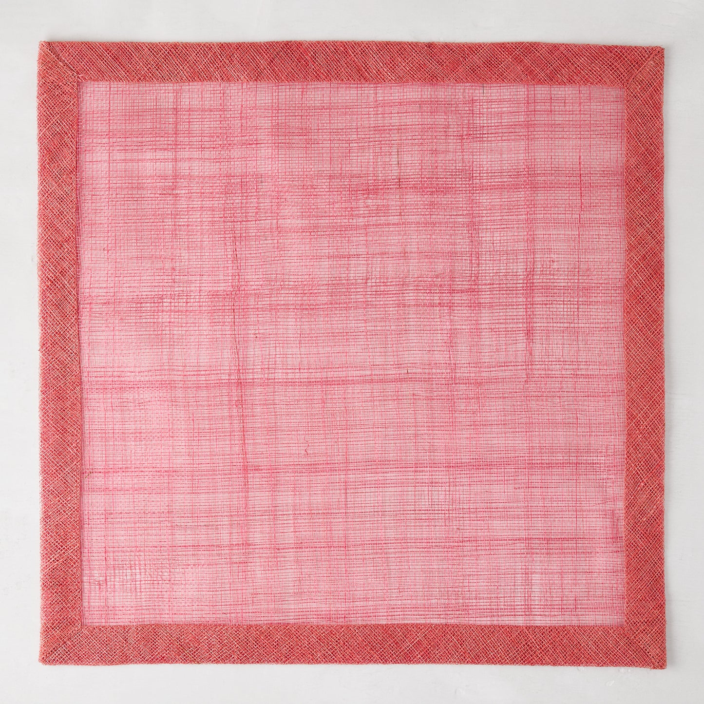 Newport Pink Square Abaca Placemat with dark pink border, 15" square.