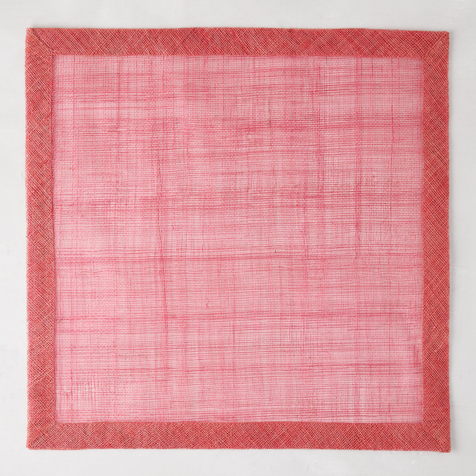 Newport Pink Square Abaca Placemat with dark pink border, 15" square.