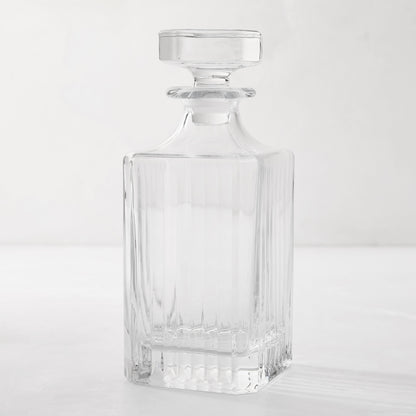 Regent 25oz clear eco-crystal decanter with etched vertical lines and a square stopper.