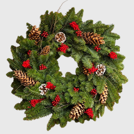 Hudson Grace 18-inch Noble Noel wreath featuring lush green pine needles, natural pinecones, and bright red berries.