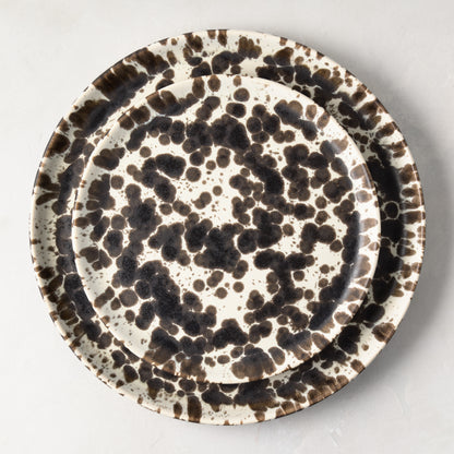 Nuno Splatter stoneware dinner plate with unique brown spots on a pale cream base.