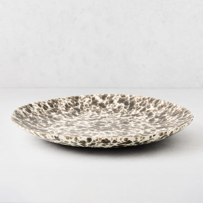 Nuno Splatter Stoneware Round Serve Platter, pale cream with unique brown splatter pattern.