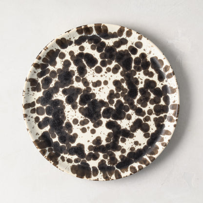 Nuno Splatter 8.2"Dia stoneware salad plate with unique brown splatter on a pale cream base.