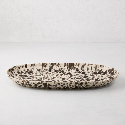 Nuno Splatter stoneware serving platter, pale cream with unique brown splatter pattern.
