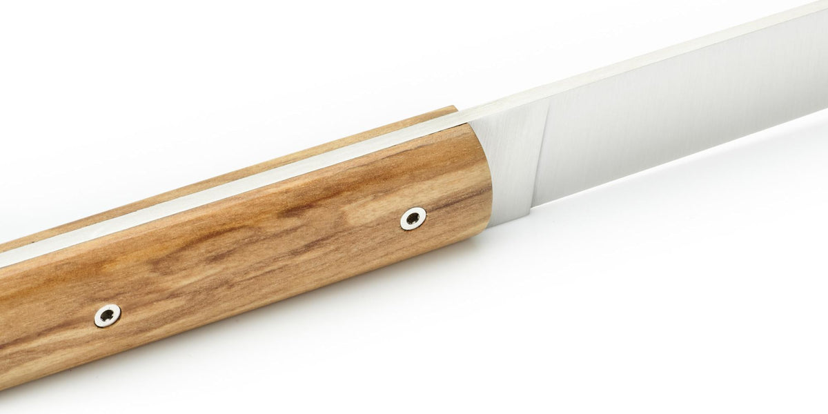 Perceval 9.47 kitchen knife with a natural olive wood handle and stainless steel blade, isolated on white.