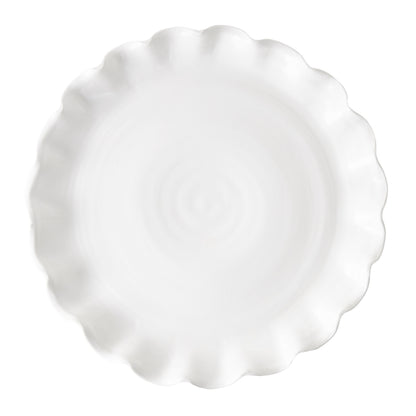 White Onda Round Ceramic Serving Platter, 20"Dia, with a ruffled, wavy edge.
